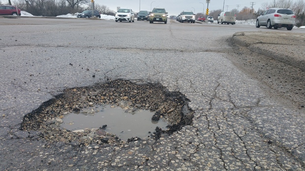 A pothole on a Winnipeg street. (Daniel Timmerman/CTV Winnipeg)
