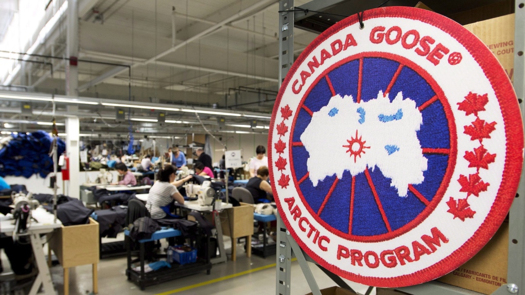 Employees work with Canada Goose jackets at the Canada Goose factory in Toronto on April 2, 2015. THE CANADIAN PRESS/Nathan Denette
