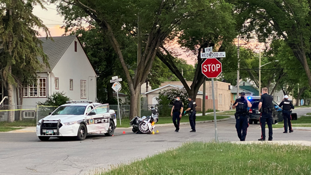 A Winnipeg police cruiser and motorcycle were involved in a collision Friday, June 4, 2021. (Stephanie Tsicos/CTV News)
