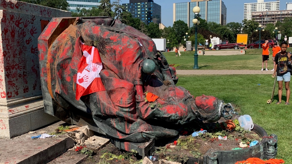 The Queen Victoria statue outside the Manitoba Legislature was taken down by demonstrators and covered in paint on Thursday, July 1, 2021. (Source: Gary Robson/CTV News)