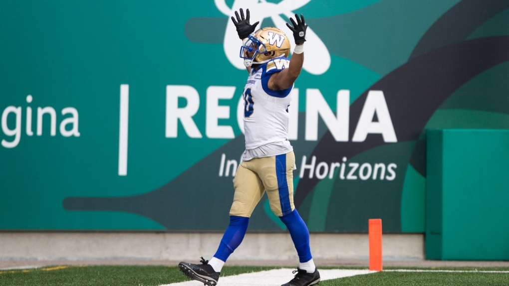 Winnipeg Blue Bombers wide receiver Nic Demski (10) celebrates after a touchdown during second half CFL football action against the Saskatchewan Roughriders, in Regina, Sunday, Sept. 5, 2021. (THE CANADIAN PRESS/Kayle Neis) 