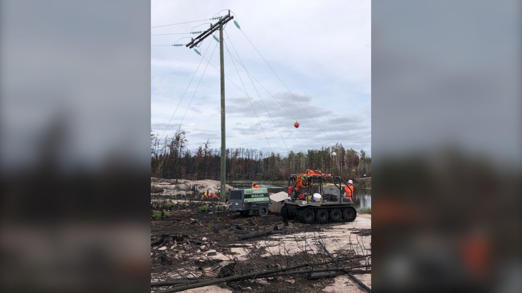Rock drilling at Pigeon River to set new poles.  (Source: Manitoba Hydro)
