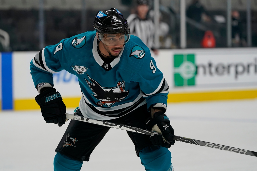 In this May 12, 2021, file photo, San Jose Sharks' Evander Kane (9) looks on during an NHL hockey game against the Vegas Golden Knights in San Jose, Calif. The Sharks placed Kane on unconditional waivers on Saturday, Jan. 8, 2022, with the intent to terminate the remainder of his $49 million, seven-year contract. (AP Photo/Jeff Chiu, File) 