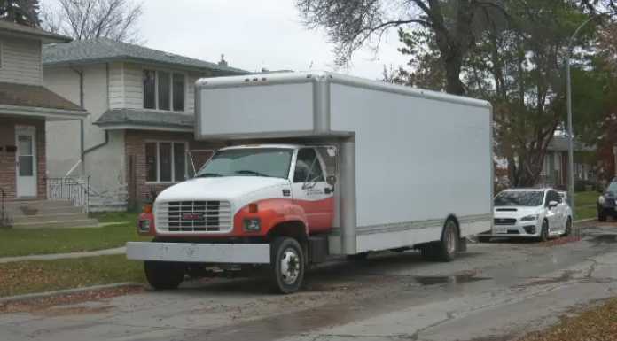 The homicide unit is investigating after a man was found dead underneath a cargo-style truck on Clyde Road. Oct. 25, 2022. (Source: Joseph Bernacki/CTV News)