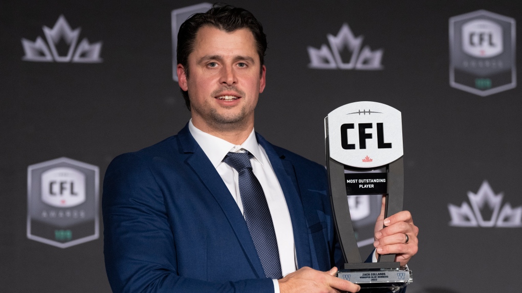 Most outstanding player, quarterback Zach Collaros of the Winnipeg Blue Bombers, holds up his trophy during the CFL Awards in Regina, Thursday, Nov. 17, 2022. THE CANADIAN PRESS/Paul Chiasson