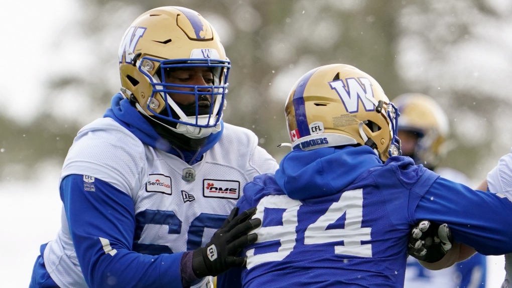Winnipeg Blue Bombers offensive lineman Stanley Bryant (66) and defensive end Jackson Jeffcoat (94) battle for position during Grey Cup team practice in Regina, Friday, Nov. 18, 2022. THE CANADIAN PRESS/Heywood Yu