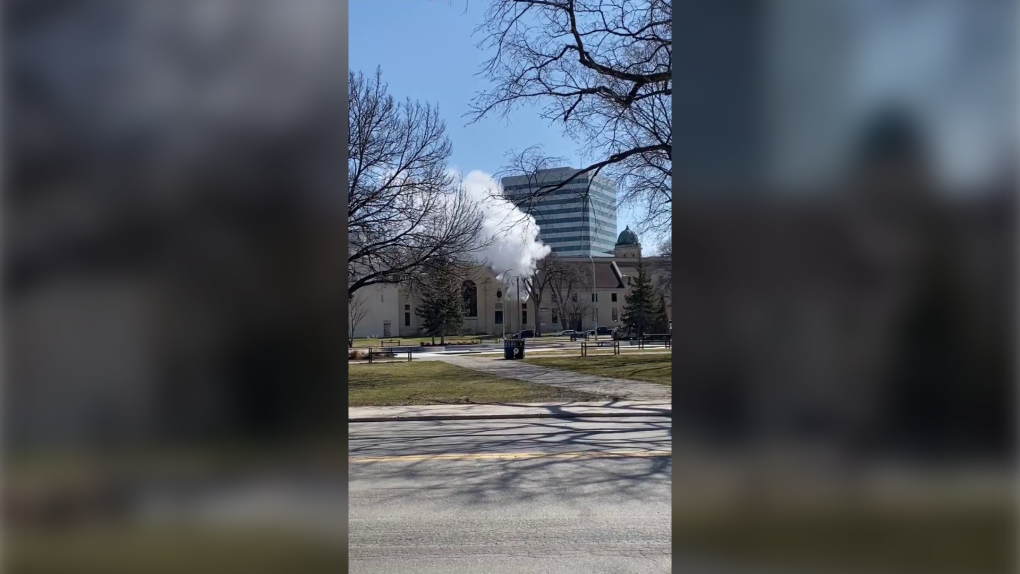 A large swath of steam is seen rising at the Archives of Manitoba building. (Image source: Chris Mulligan)