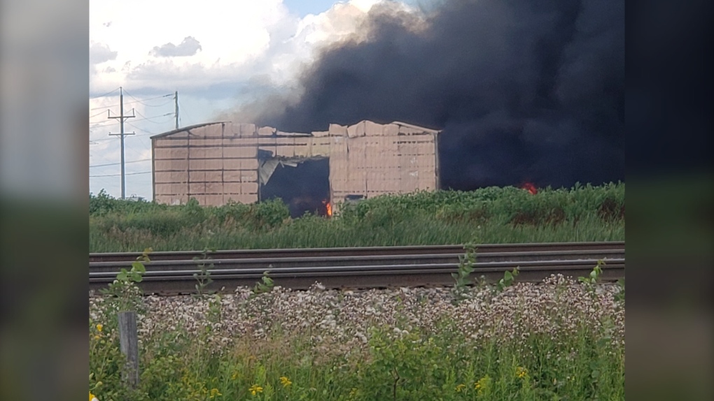 A fire burns on Symington Road on the outskirts of Winnipeg on August 3, 2022. (Submitted photo Liam Harder)