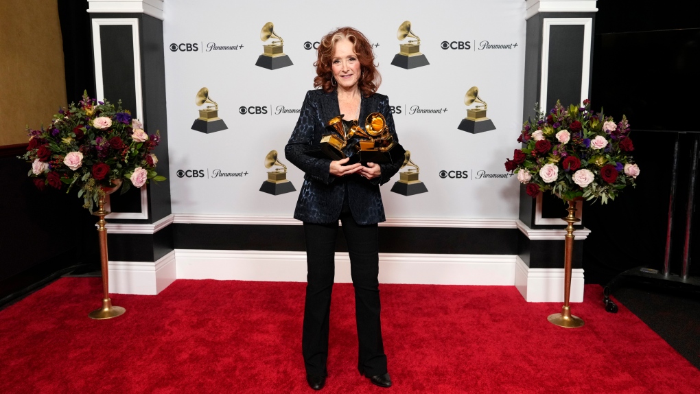 Bonnie Raitt, winner of the awards for best Song of the Year "Just Like That," Best American Roots Song "Just Like That" and Best Americana Performance of "Made Up Mind," poses in the press room at the 65th annual Grammy Awards on Sunday, Feb. 5, 2023, in Los Angeles. (AP Photo/Jae C. Hong)