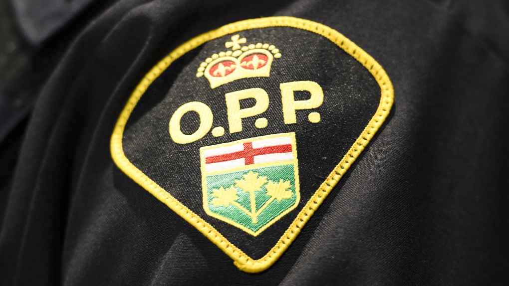 An Ontario Provincial Police logo is shown during a press conference in Barrie, Ont., on April 3, 2019. THE CANADIAN PRESS/Nathan Denette