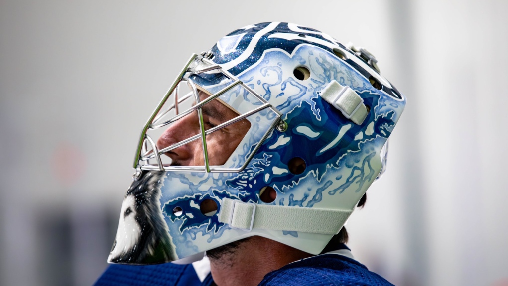 The newest mask for Connor Hellebuyck. It features Lake Winnipeg, a bass and his dog Tinley. The mask was designed by Steve Nash, the owner of Eye candy Air. (Source: Winnipeg Jets/X. Sept. 15, 2023)