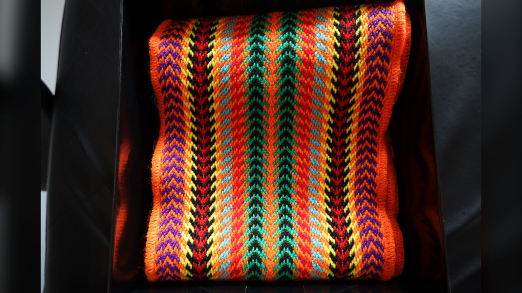 The sash is made up of seven uniquely coloured strands, each with its own significance. (Source: MMF)