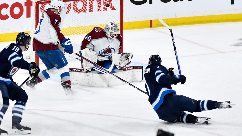 Winnipeg Jets' Vladislav Namestnikov scores on Colorado Avalanche goaltender Alexandar Georgiev during the first period in Game 1 of their NHL hockey Stanley Cup first-round playoff series in Winnipeg on Sunday April 21, 2024. (Fred Greenslade/The Canadian Press)
