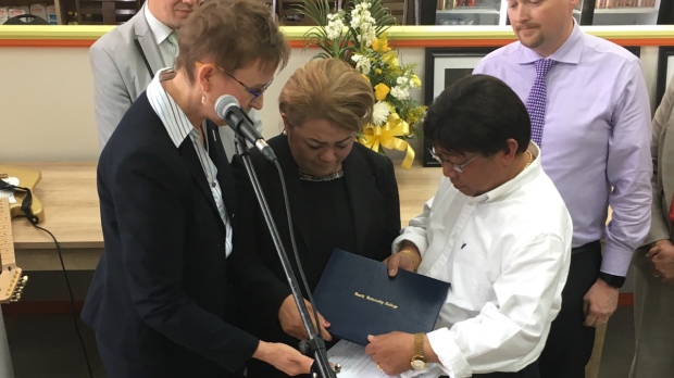Jaime Adao's parents recieve honorary diploma